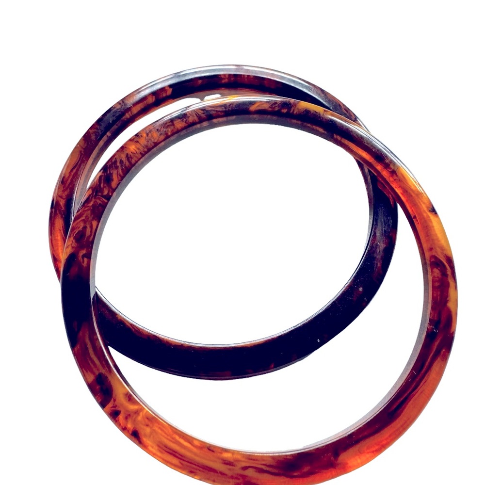 Pair of tortoise colored vintage Bakelite bangle bracelets. EC